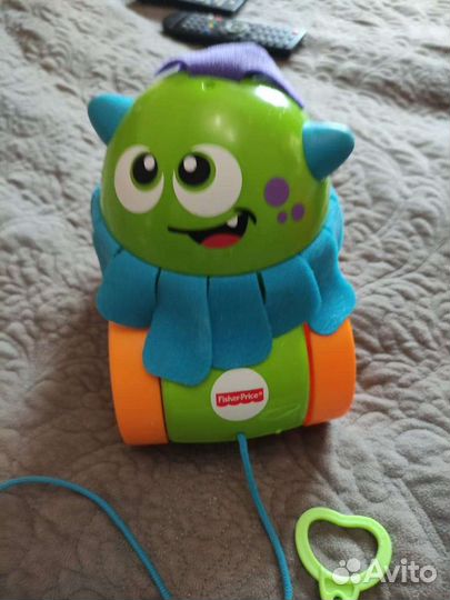 Игрушка каталка Fisher Price Монстрик