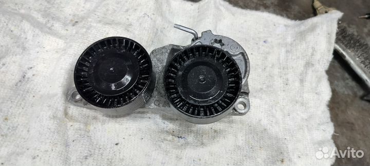 Натяжной ролик