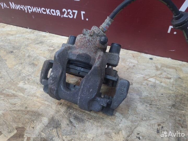 Суппорт тормозной передний левый Renault Logan