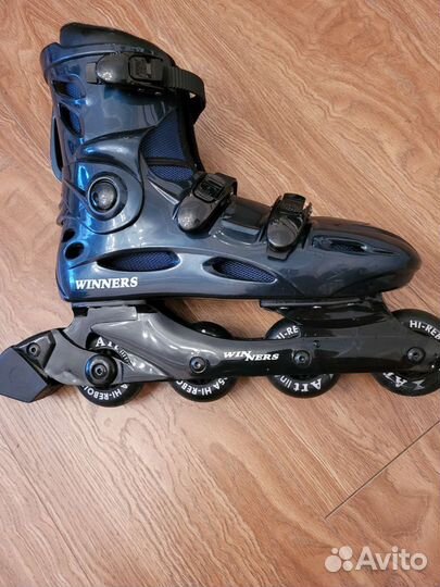 Роликовые коньки