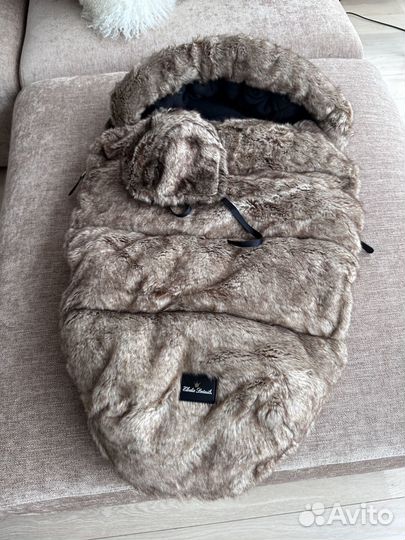 Меховой конверт в коляску