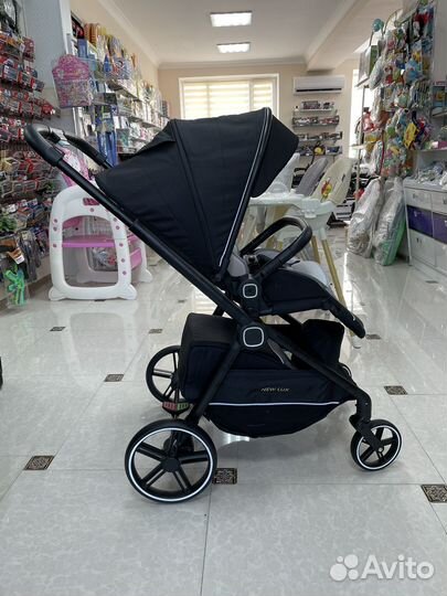 Коляска New Lux с реверсивным блоком
