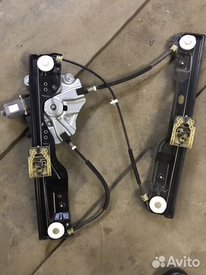 Передний электро стеклоподъемник левый Опель Астра