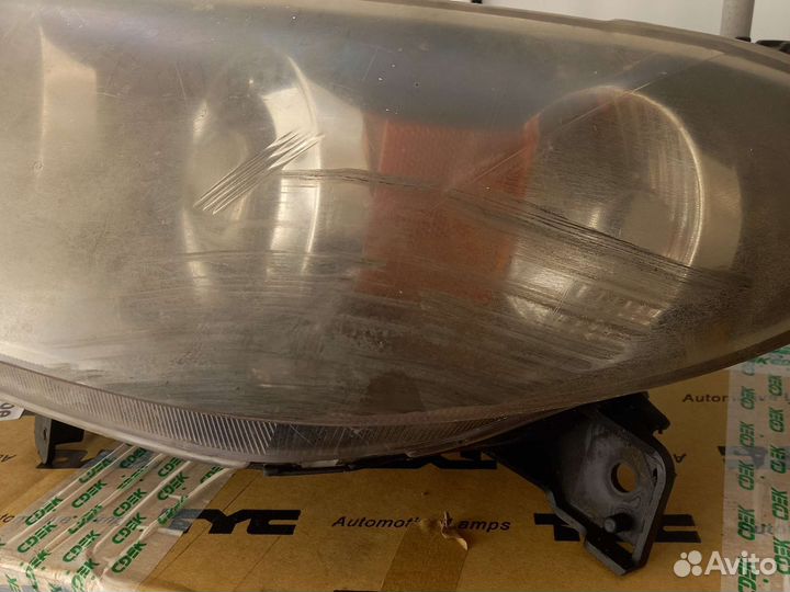 Фара мазда аксела седан левая