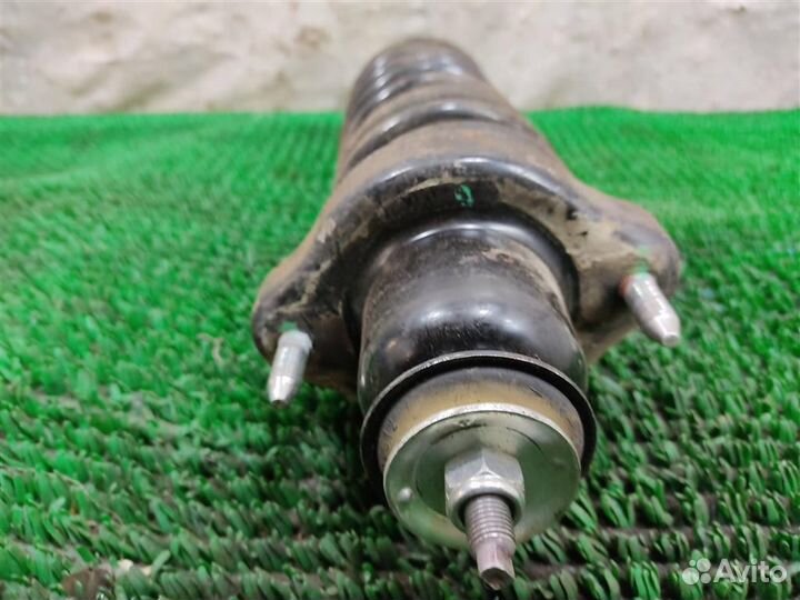 Стойка амортизатора задняя Mitsubishi Lancer 10 2