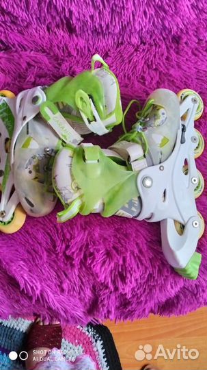 Роликовые коньки