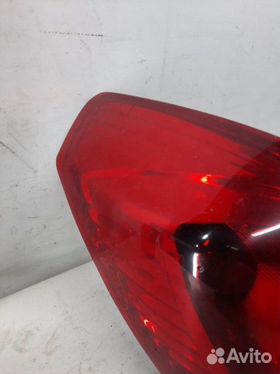 Фонарь задний левый Opel Corsa хэтчбэк 3 дв. 1.2