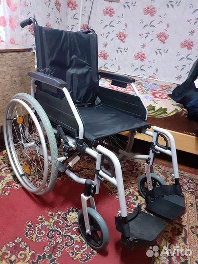 Инвалидная коляска на фото образец