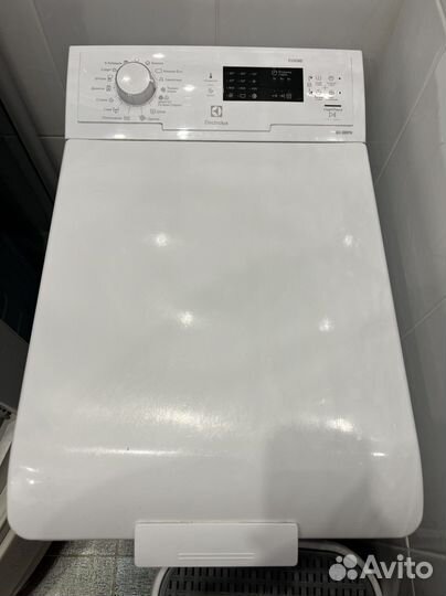 Стиральная машина с вертикальной загрузкой