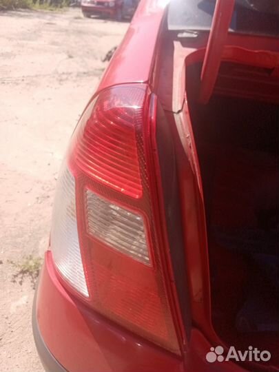 Фонарь задний левый Renault Symbol 1