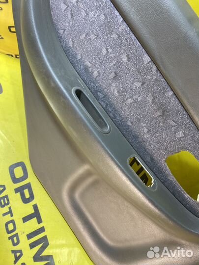 Обшивка задней левой двери Kia Spectra