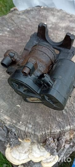 Суппорт тормозной задний левый