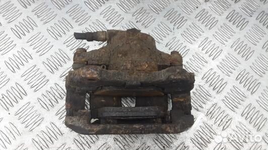 Суппорт тормозной передний левый opel corsa D (NNI