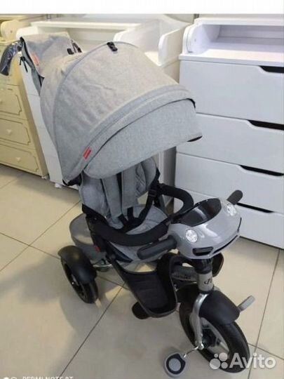 Трехколесный велосипед с ручкой