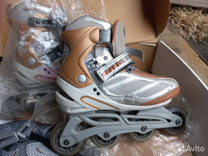 Роликовые коньки