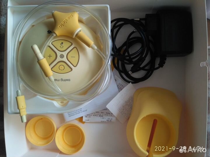 Молокоотсос medela swing maxi