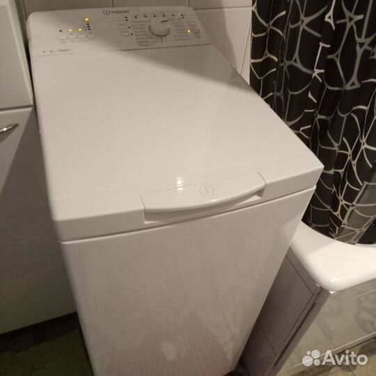 Стиральная машина с вертикальной загрузкой