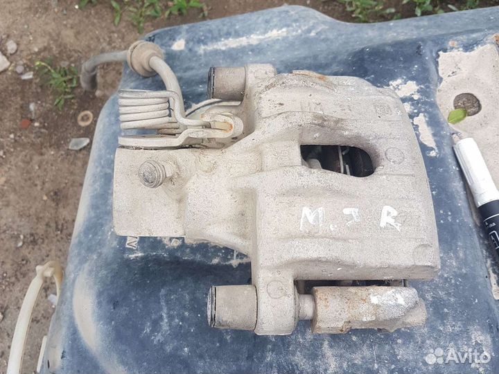 Суппорт тормозной mazda 3 бк 1.6