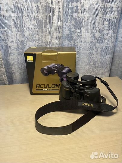 Бинокль nikon aculon a211