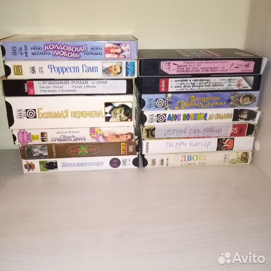 Видеокассеты с фильмами и мультиками