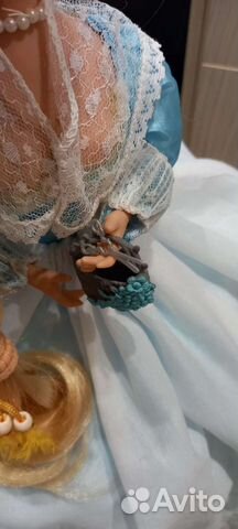 Кукла музыкальная