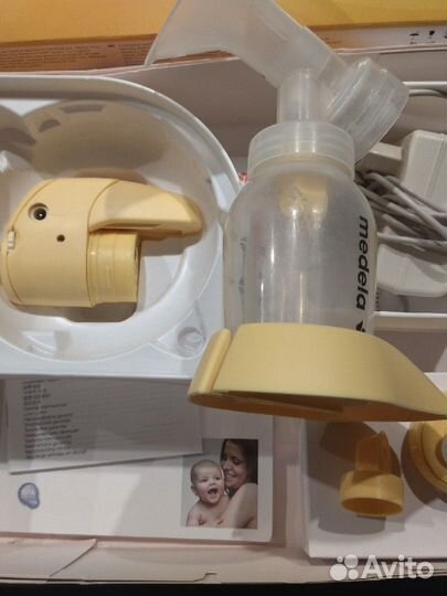 Молокоотсос medela электрический