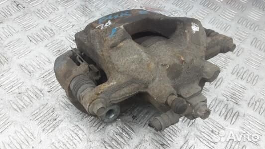 Суппорт тормозной передний левый opel astra J (PUK