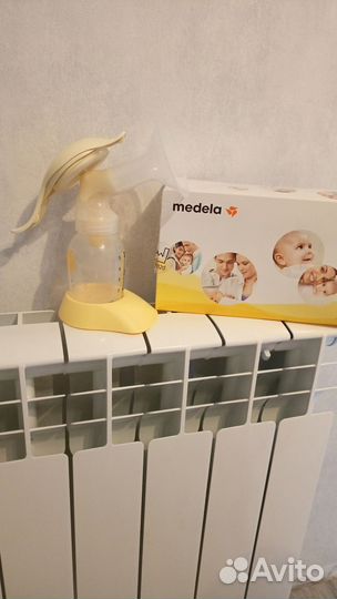 Молокоотсос medela ручной