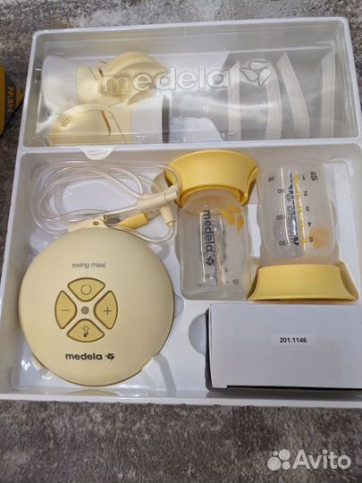 Молокоотсос medela электрический