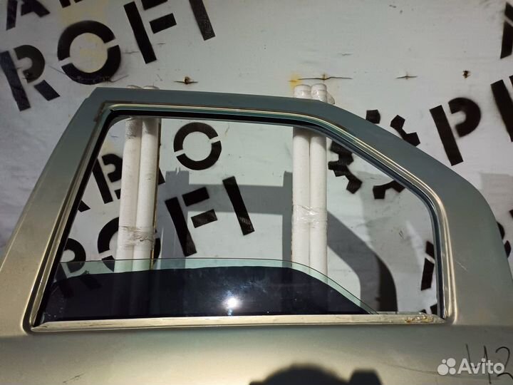 Стекло двери задней правой Renault Logan