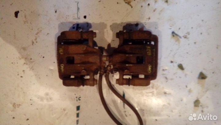 Суппорт тормозной задний Hyundai Tucson