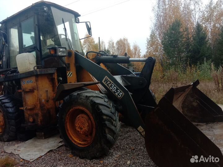 Экскаватор погрузчик