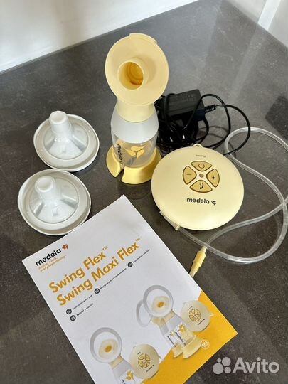 Молокоотсос medela swing электрический