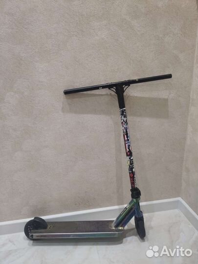 Трюковой самокат Triad Racketeer