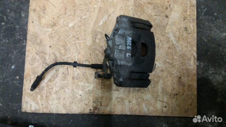 Суппорт тормозной передний левый Audi Alroad A6 C6