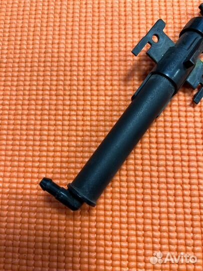 Форсунка омывателей фар передняя левая Land Rover