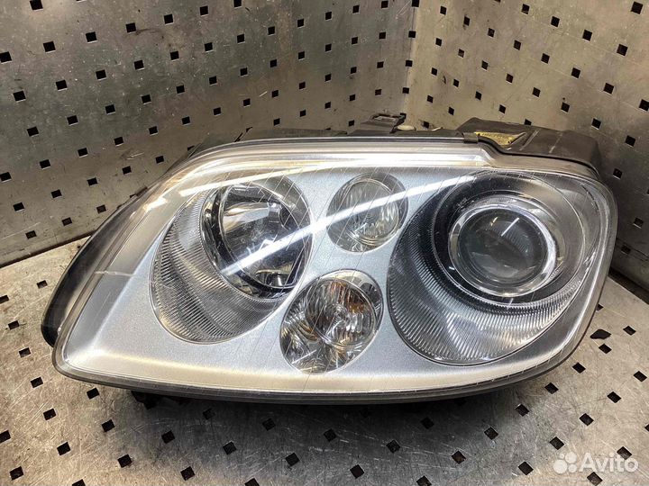 Фара левая Volkswagen Touran