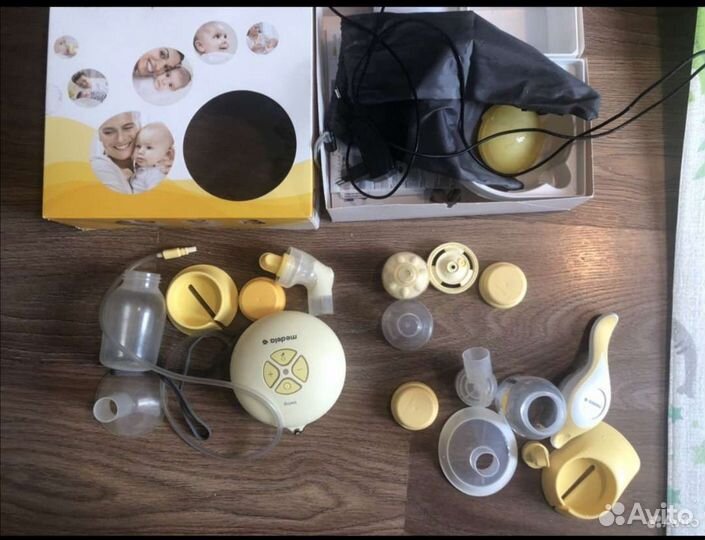 Молокоотсос medela swing электрический
