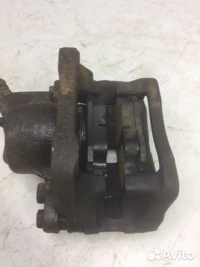 Суппорт передний правый Renault Logan седан 1.6