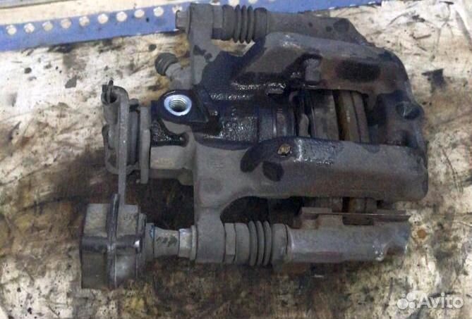 Суппорт задний правый Chevrolet Cruze