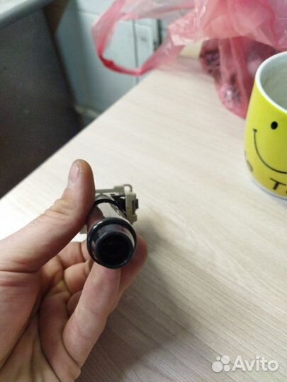 Форсунка омывателя фары передняя левая Toyota Land