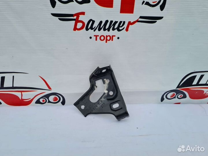 Кронштейн крыла передний Opel Astra J