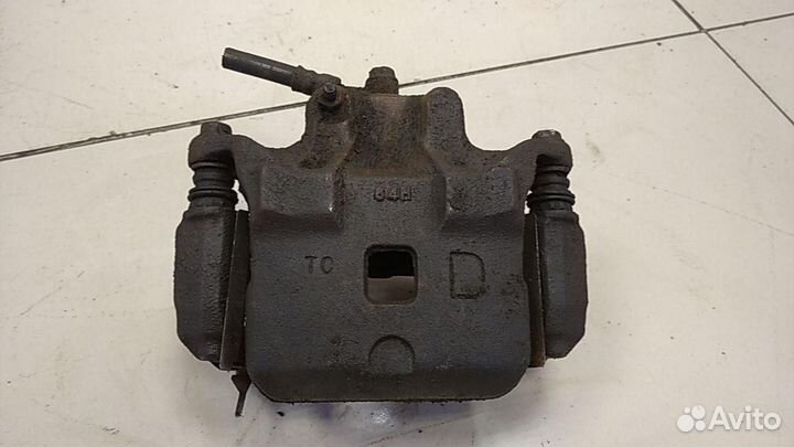 Суппорт передний правый Nissan Teana