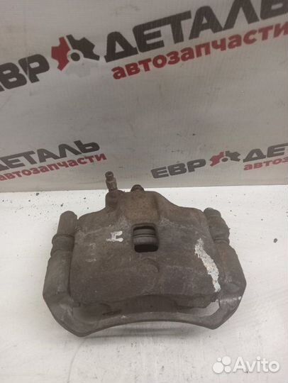 Суппорт тормозной передний правый Hyundai Accent