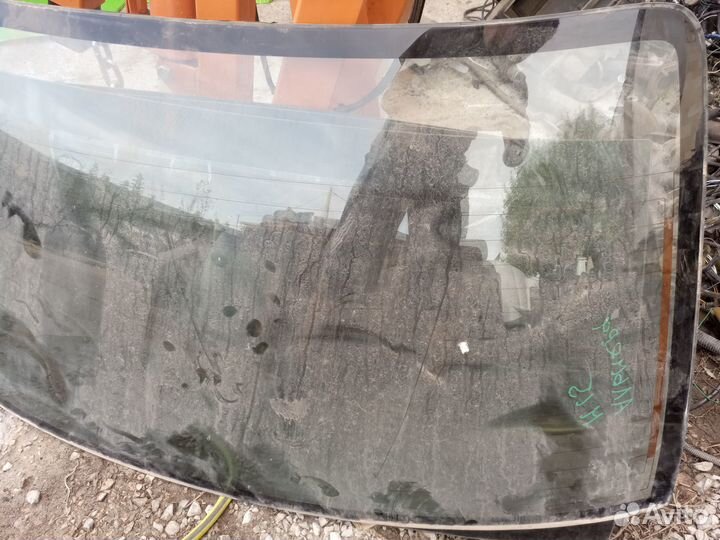 Стекло заднее Nissan Almera n15