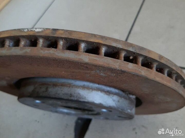 Тормозной диск передний Mitsubishi Lancer 9