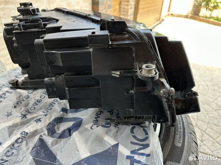 Фара левая tiguan