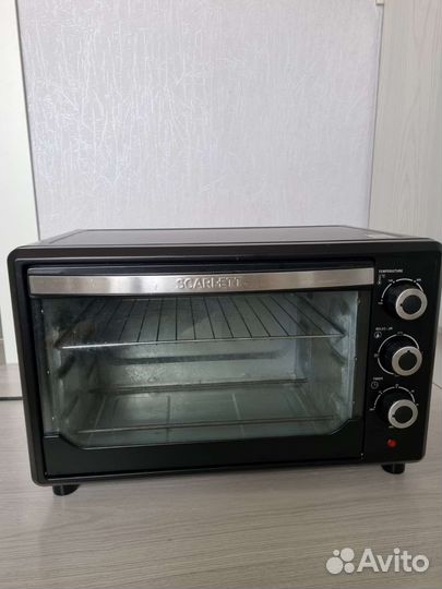 Электрическая мини печь Scarlett SC-EO93O15