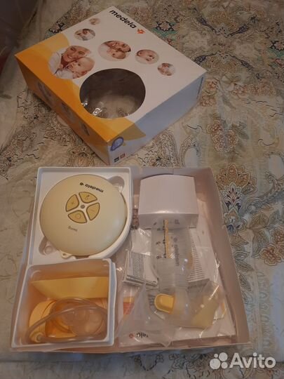 Молокоотсос электрический medela