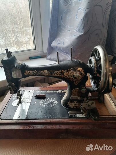 Швейная машина Singer